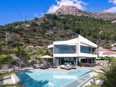 Exterior view of the villa featuring an infinity pool and lounge area, with mountain views.