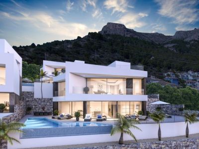 Exterior view of the villa featuring an infinity pool and modern design, blending with Calpe's mountainous landscape.