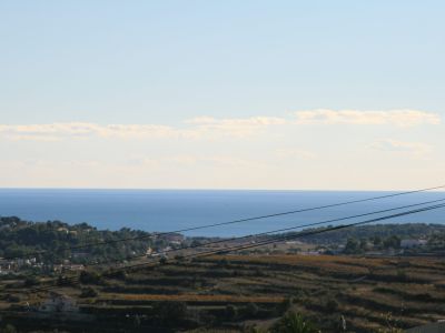 View of the land with the Mediterranean Sea in the background, showcasing its location and landscape potential.