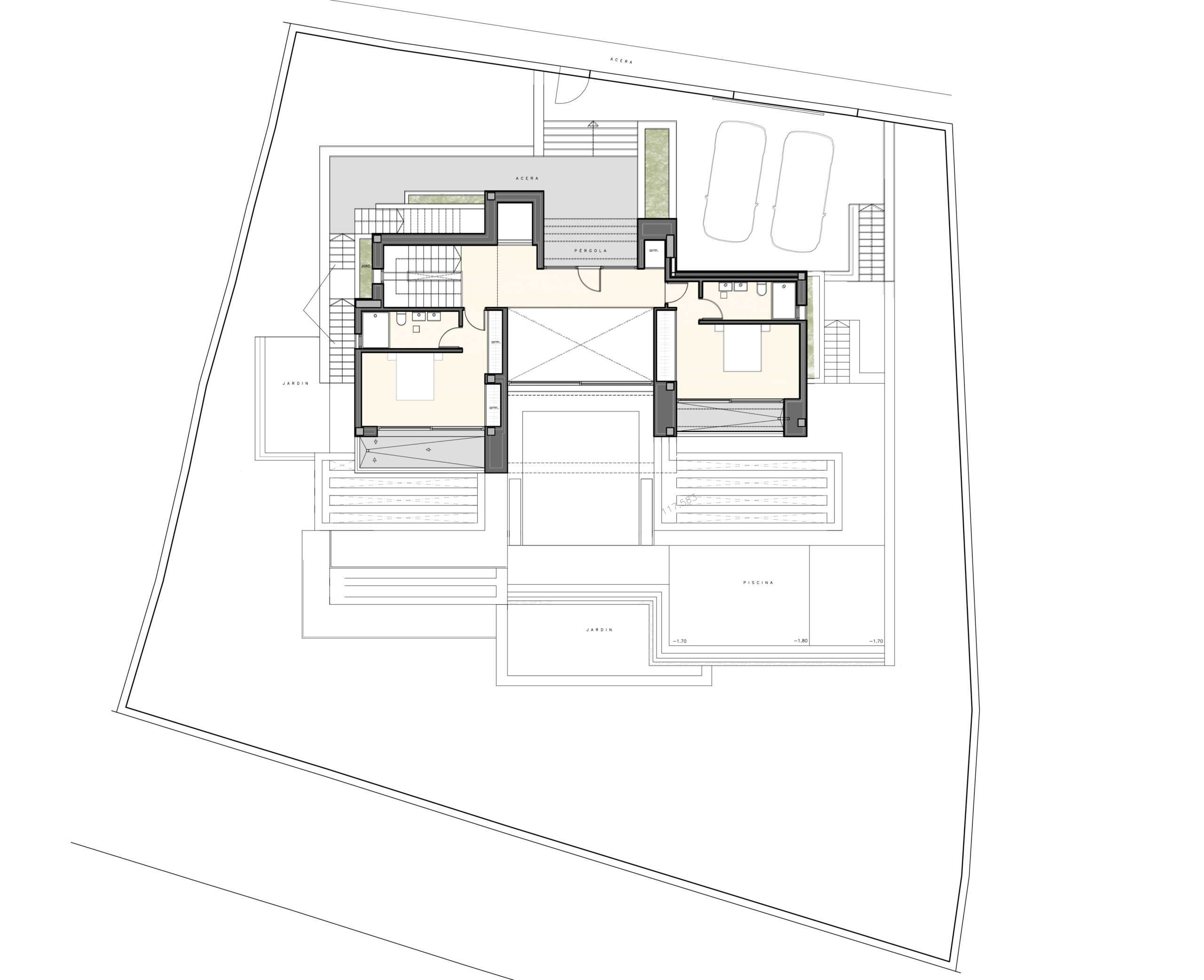 Detailed floor plan of the first floor illustrating the layout of two en-suite bedrooms, the main entrance, and the surrounding garden and parking areas.