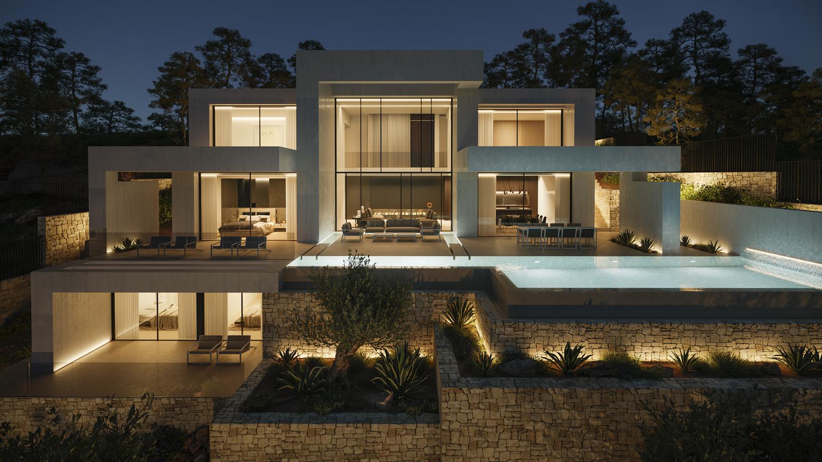 Night view of the modern facade featuring integrated lighting, an infinity pool, and natural stone walls that terrace the Mediterranean garden across multiple levels.