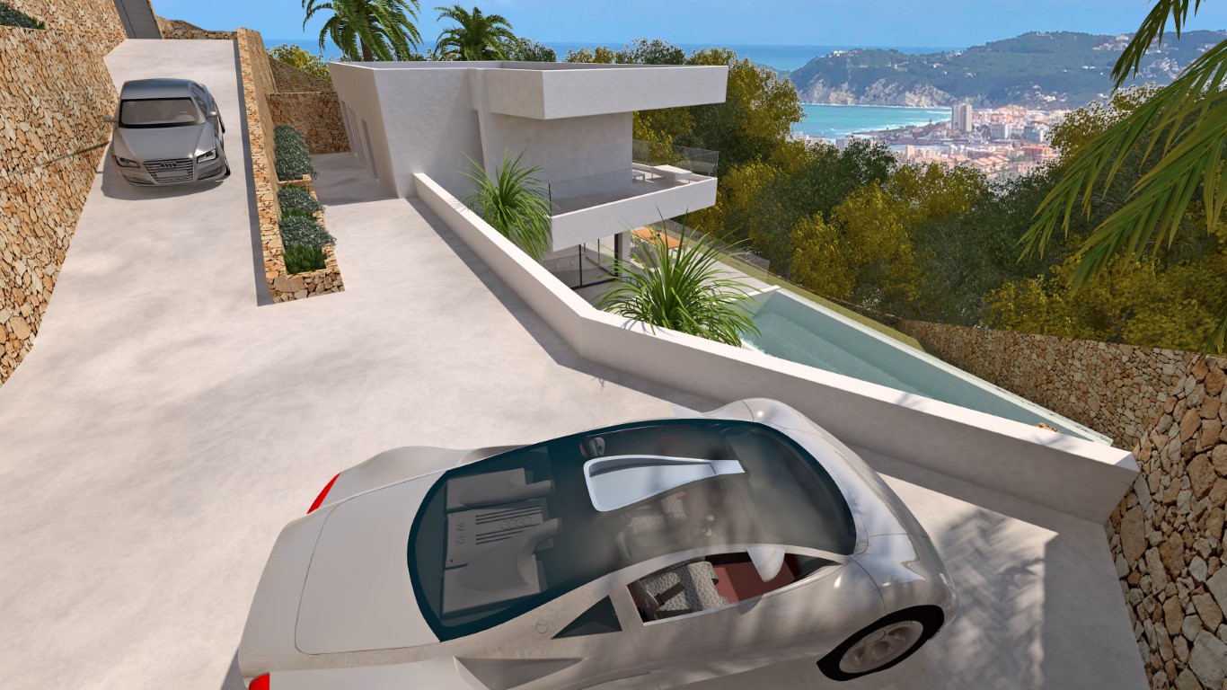 Elevated view of the villa's driveway featuring natural stone walls, ample parking space, and panoramic views over the Mediterranean Sea and Jávea.