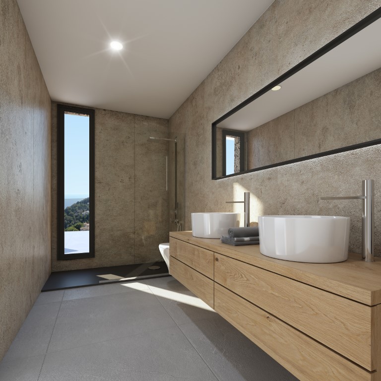 En-suite bathroom featuring a double vessel sink vanity in oak, stone-textured walls, a walk-in shower, and a vertical window offering natural light.