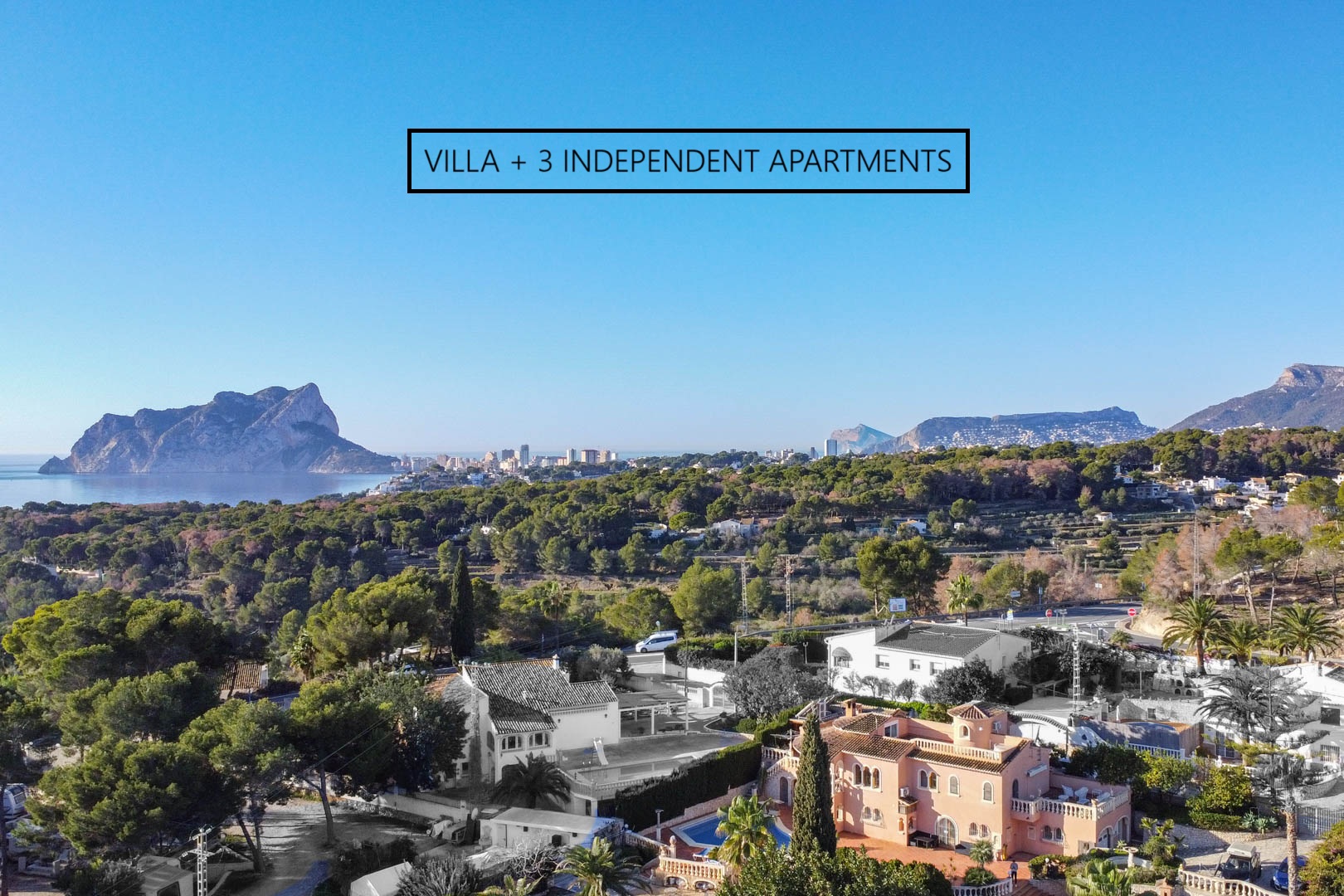 Aerial perspective of the highlighted villa, showcasing its Mediterranean design and panoramic views towards the Peñón de Ifach and the sea.
