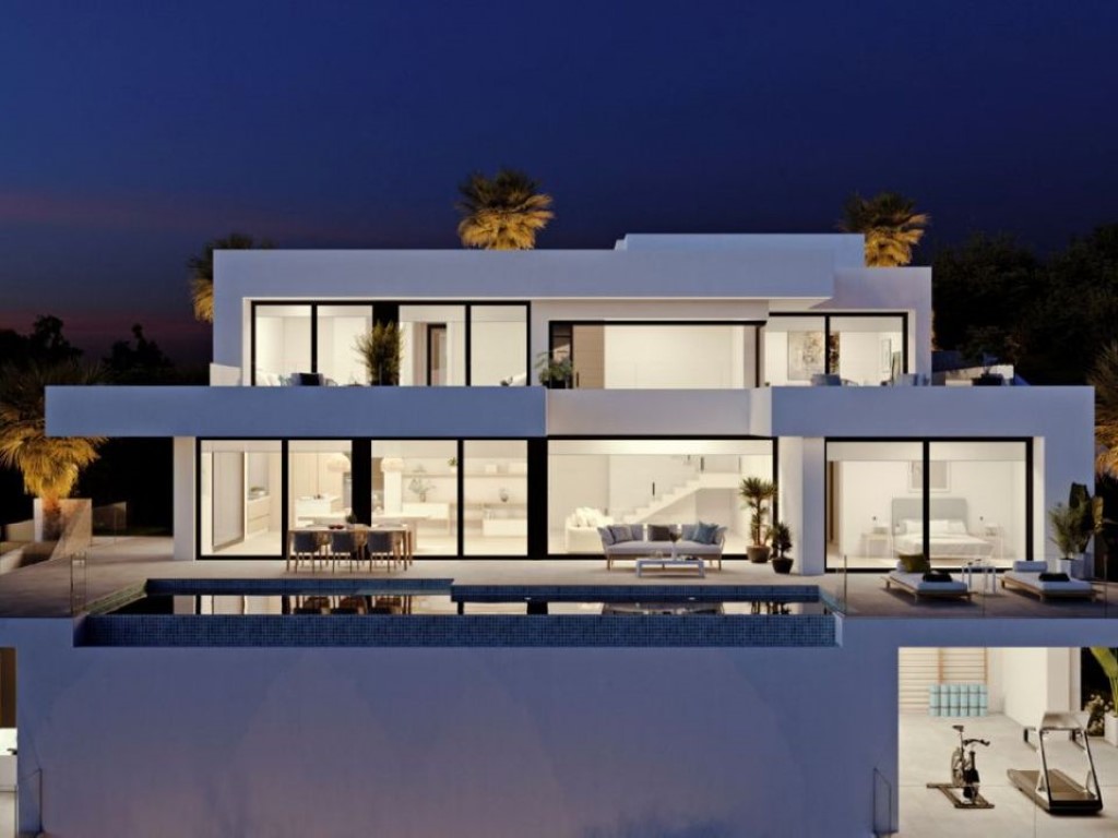 Three-level modern facade at dusk featuring floor-to-ceiling windows, an infinity pool, and a visible lower-level gym with fitness equipment.
