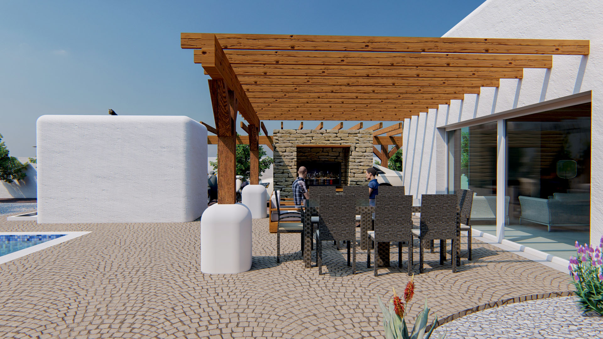 Outdoor dining area featuring a robust wooden pergola, natural stone fireplace wall, and cobblestone terrace adjacent to the swimming pool.