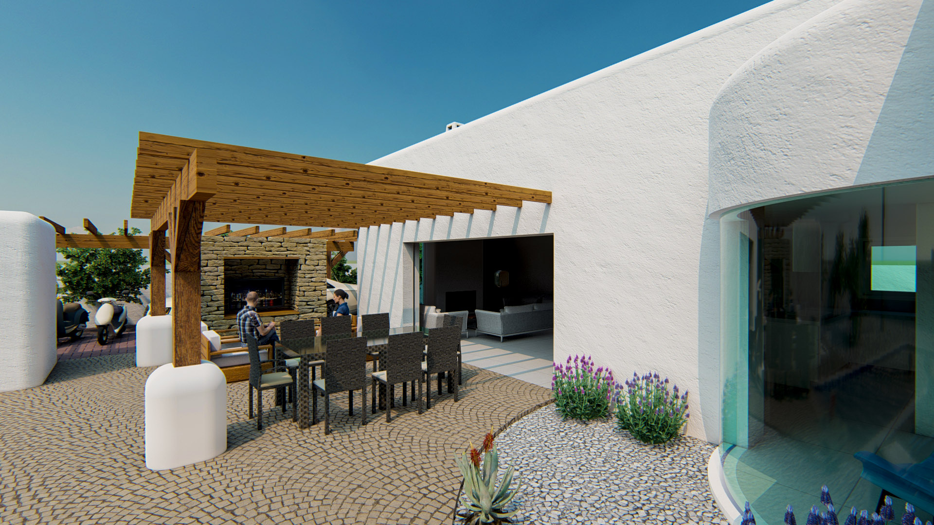 Outdoor terrace featuring a wooden pergola, dining area with cobblestone paving, and seamless access to the interior living space.