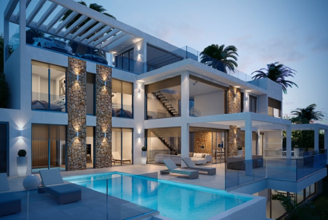 Three-level modern facade featuring an infinity pool, dry stone walls, and expansive terraces with contemporary lighting at dusk.