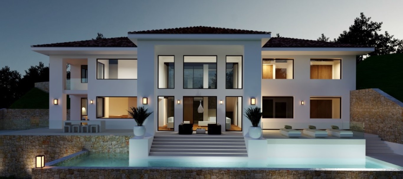 Exterior facade of the villa at dusk, featuring an infinity pool, natural stone walls, and large floor-to-ceiling windows with warm interior lighting.