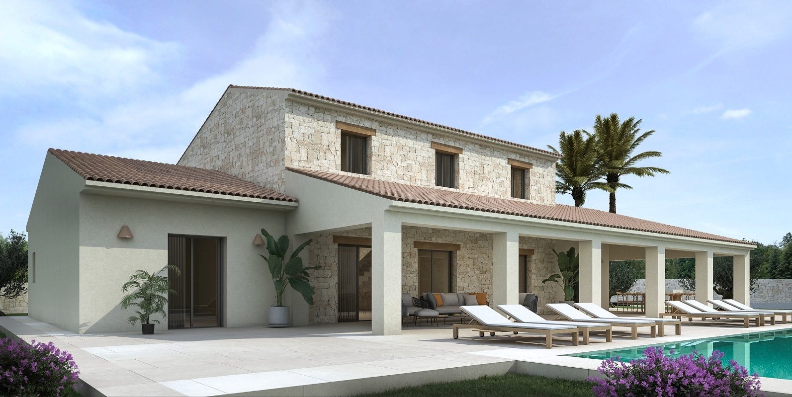 Finca-style exterior featuring natural stone walls, a deep covered porch with lounge areas, and a spacious pool terrace with sunbeds.