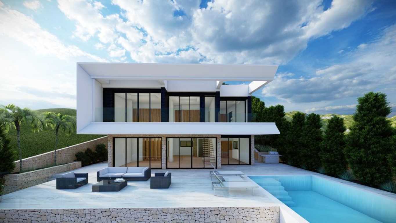 Modern two-story villa facade featuring floor-to-ceiling glazing, a stone-clad lower level, infinity pool, and a spacious terrace with contemporary lounge furniture.