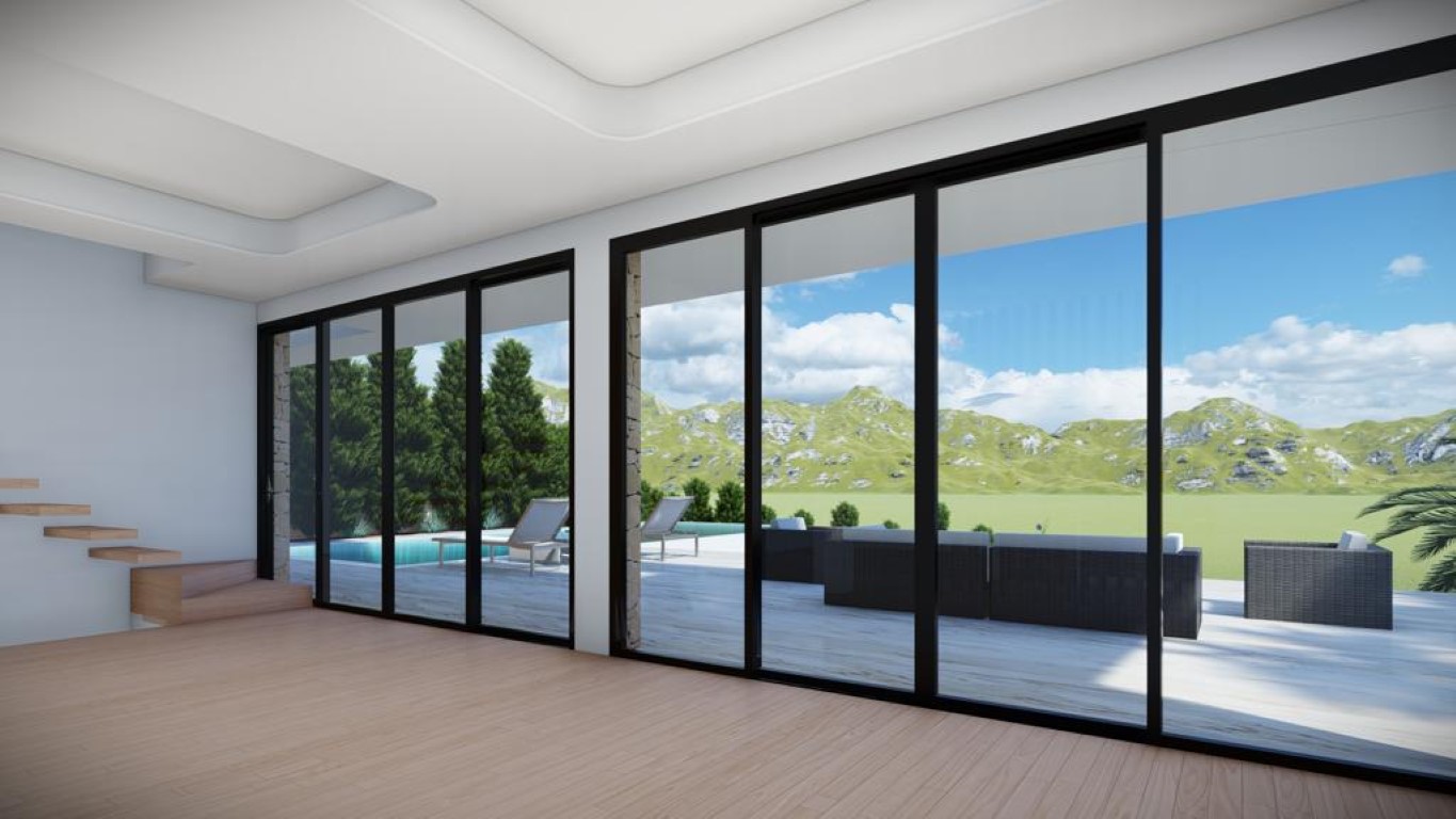 Open-plan living area featuring light wood flooring, recessed ceiling details, and floor-to-ceiling glass doors opening to the terrace and infinity pool.