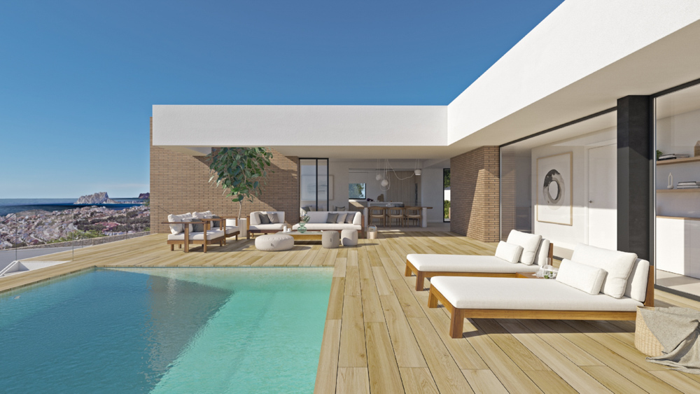 Main terrace featuring wooden decking, an infinity pool, and designer outdoor furniture overlooking the Mediterranean Sea and Peñón de Ifach.