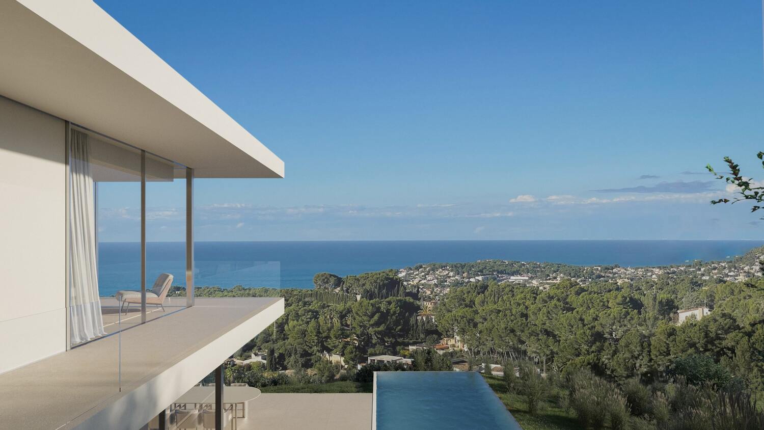 This upper-level terrace features a minimalist glass balustrade and white architectural lines, offering panoramic views of the Mediterranean coastline and the infinity pool below.