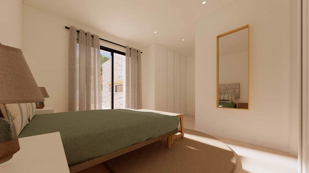 Ibicencan-style bedroom featuring built-in wardrobes, wooden furniture, and floor-to-ceiling windows opening towards a traditional dry stone wall exterior.
