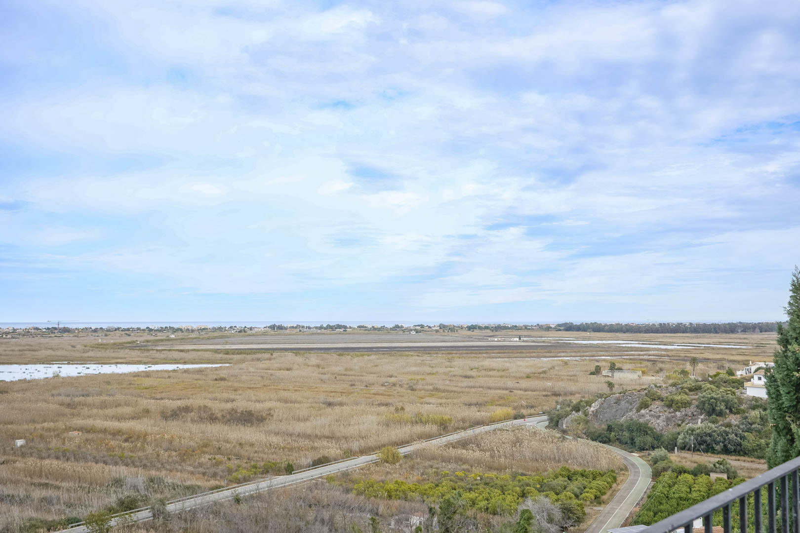Panoramic view of the Marjal de Pego nature reserve and coastline from Monte Pego.