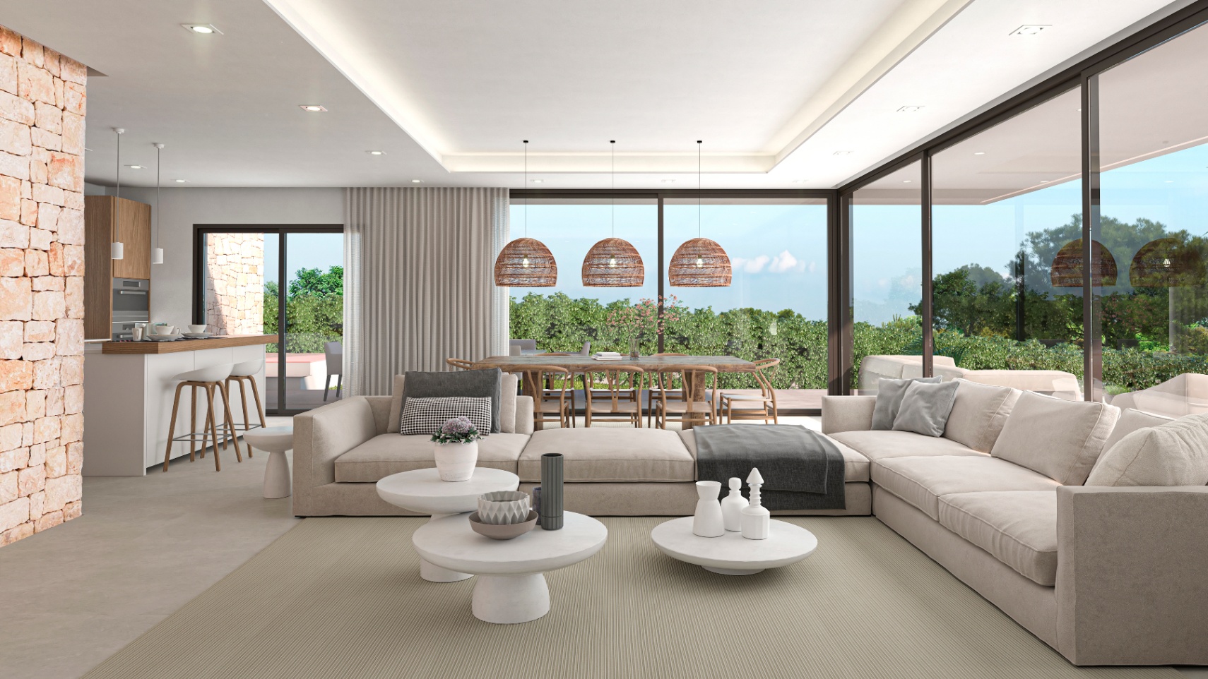 Bright living room featuring an exposed stone wall, modular beige sofas, and garden views.