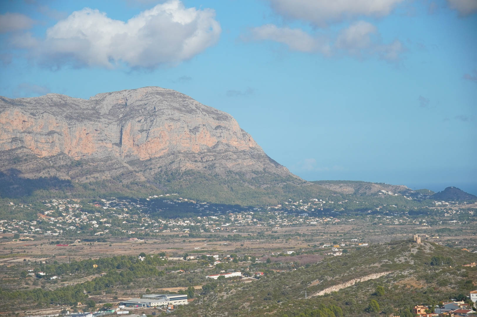 Panoramic views from the property overlooking the Montgó mountain massif, the surrounding valley, and the Mediterranean Sea horizon.