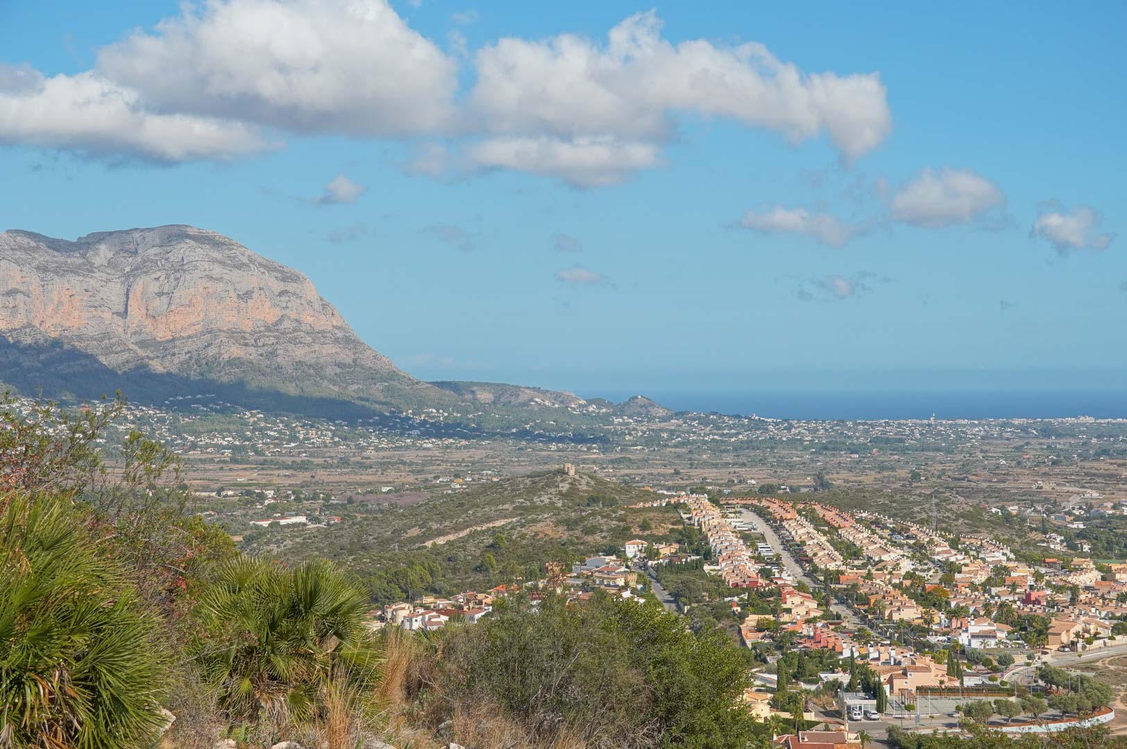 Panoramic views from the property overlooking the Pedreguer valley, the majestic mountain range, and the Mediterranean Sea on the horizon.