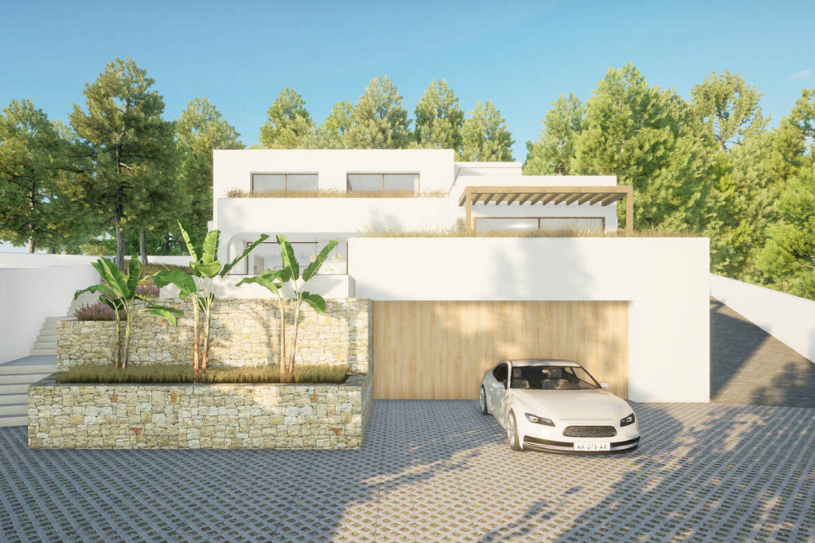 Exterior view of the villa with a white facade, wooden garage, and stone garden with greenery.