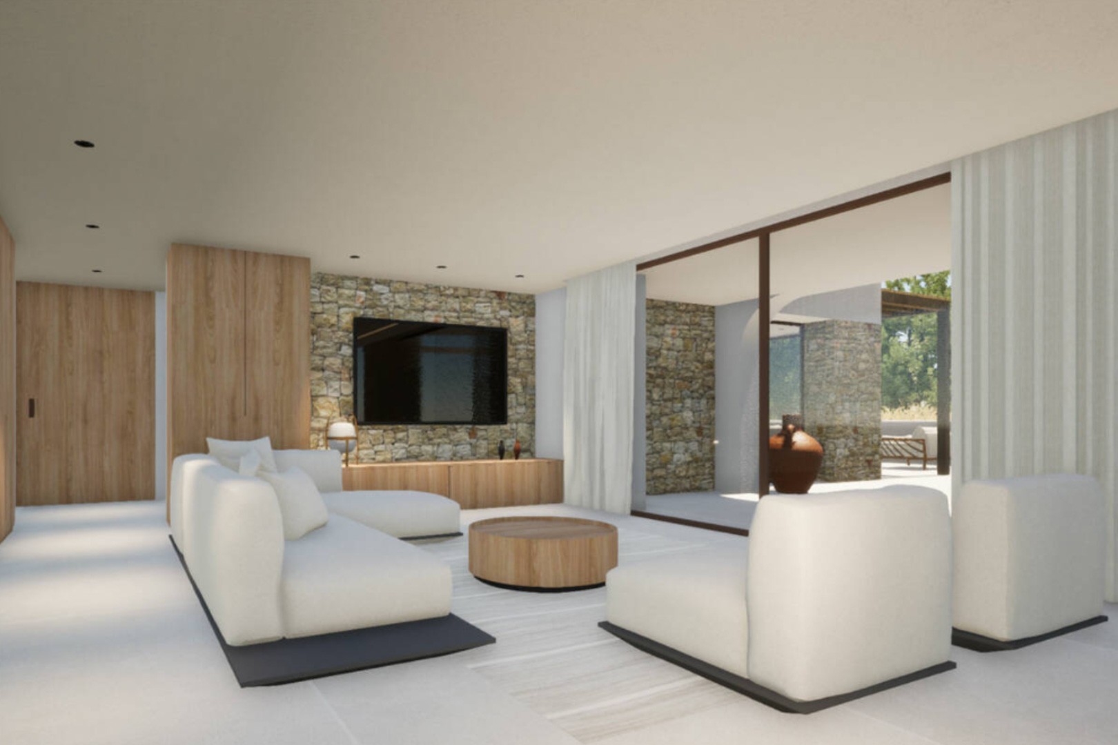 Living room featuring a stone wall, white modular sofa, and a round wooden coffee table.