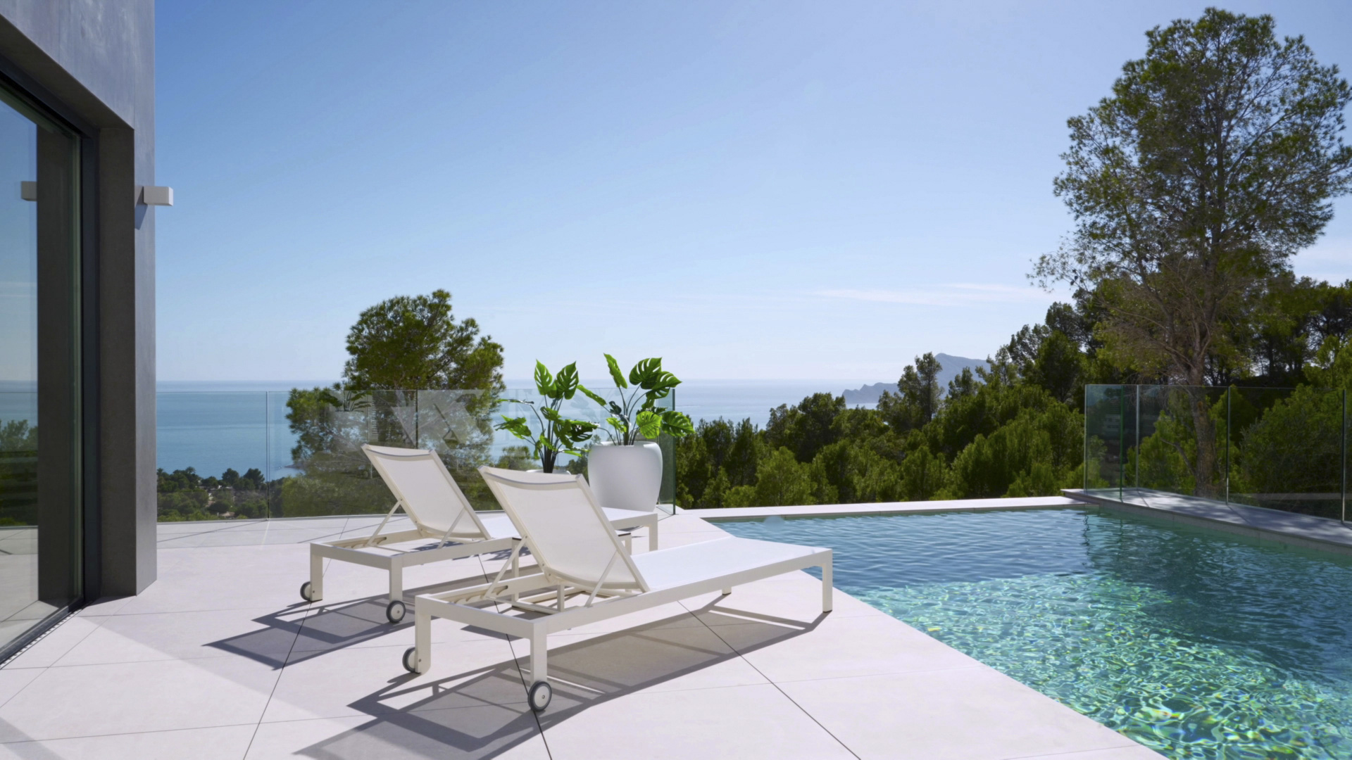 Outdoor terrace featuring an infinity pool, minimalist white sun loungers, and glass railings overlooking the Mediterranean Sea and surrounding pine forest.