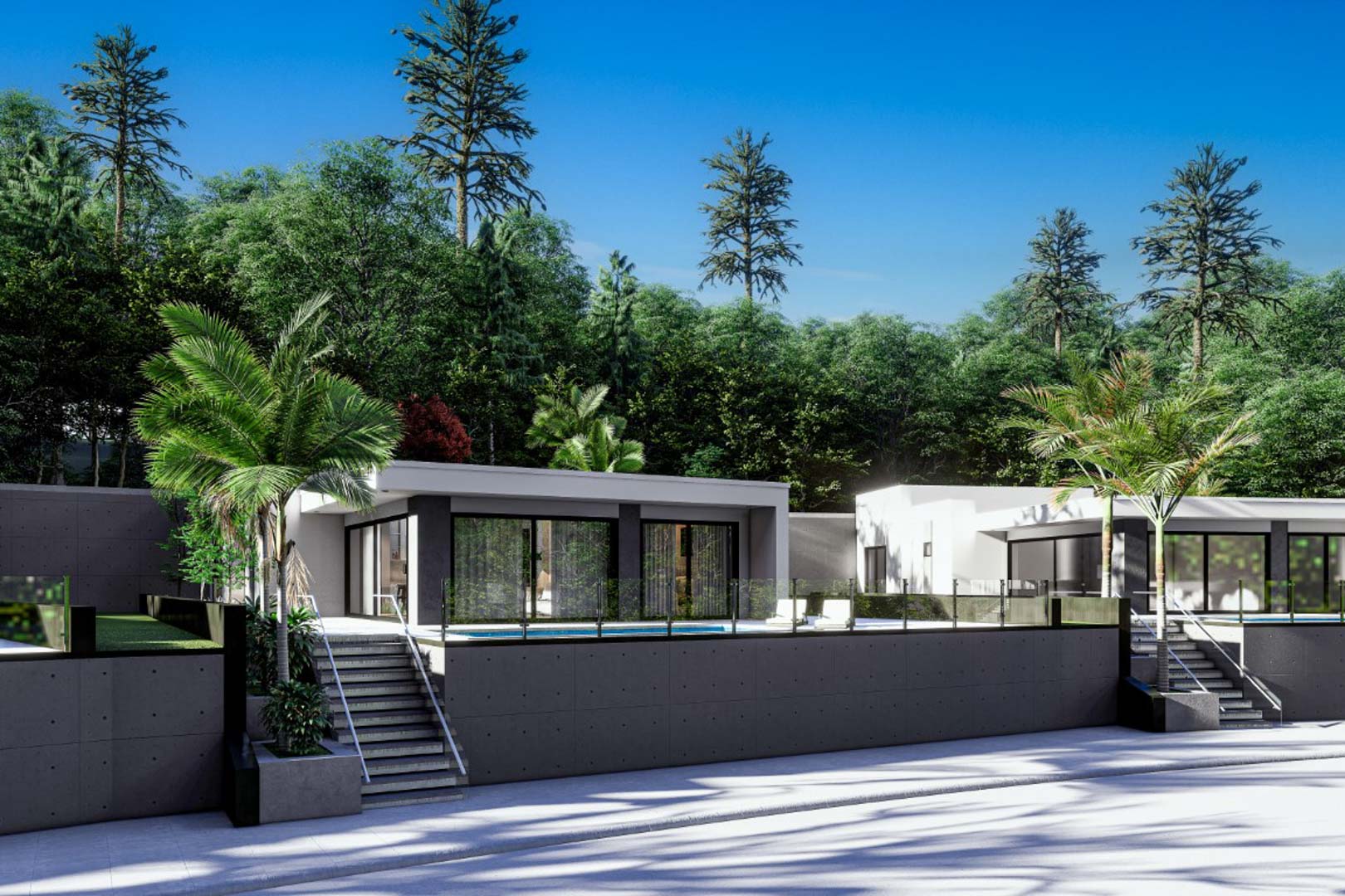 Modern facade featuring exposed concrete walls, large glass sliders, and elevated terraces with glass railings, set against a backdrop of lush pine forest.