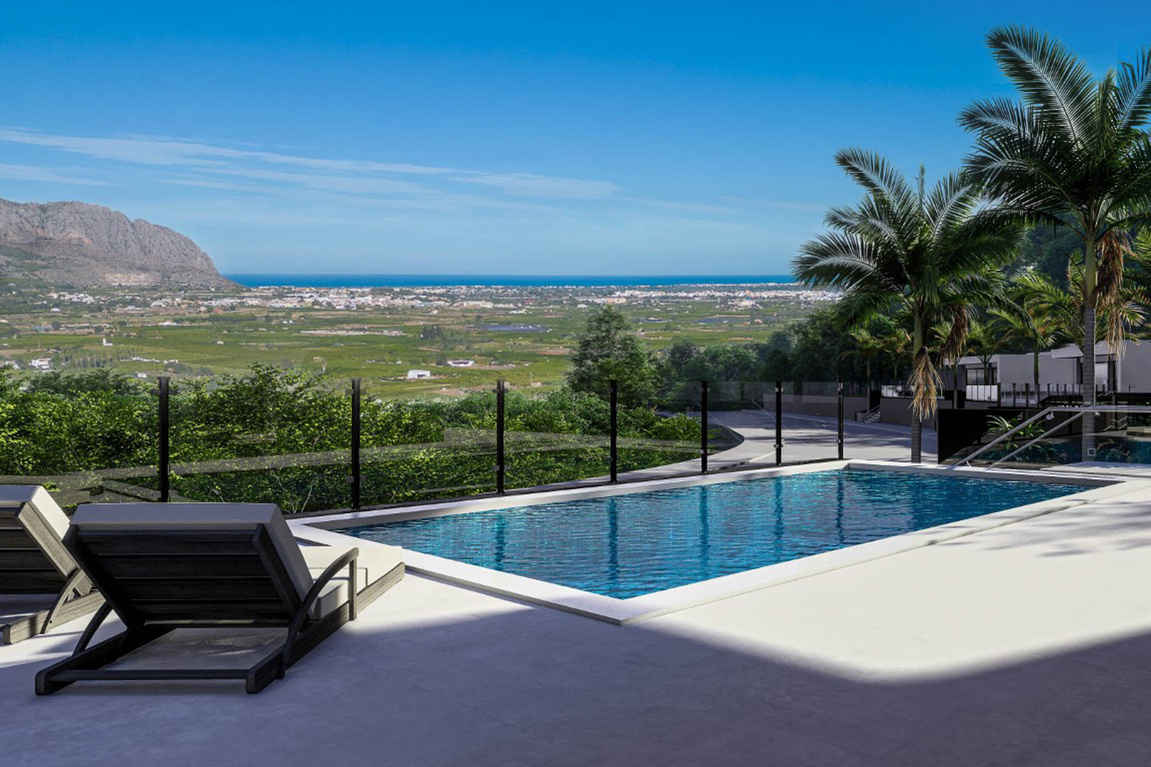 Outdoor terrace featuring a 6x3 meter swimming pool with glass railings, offering unobstructed panoramic views of the Pedreguer valley and the distant sea.