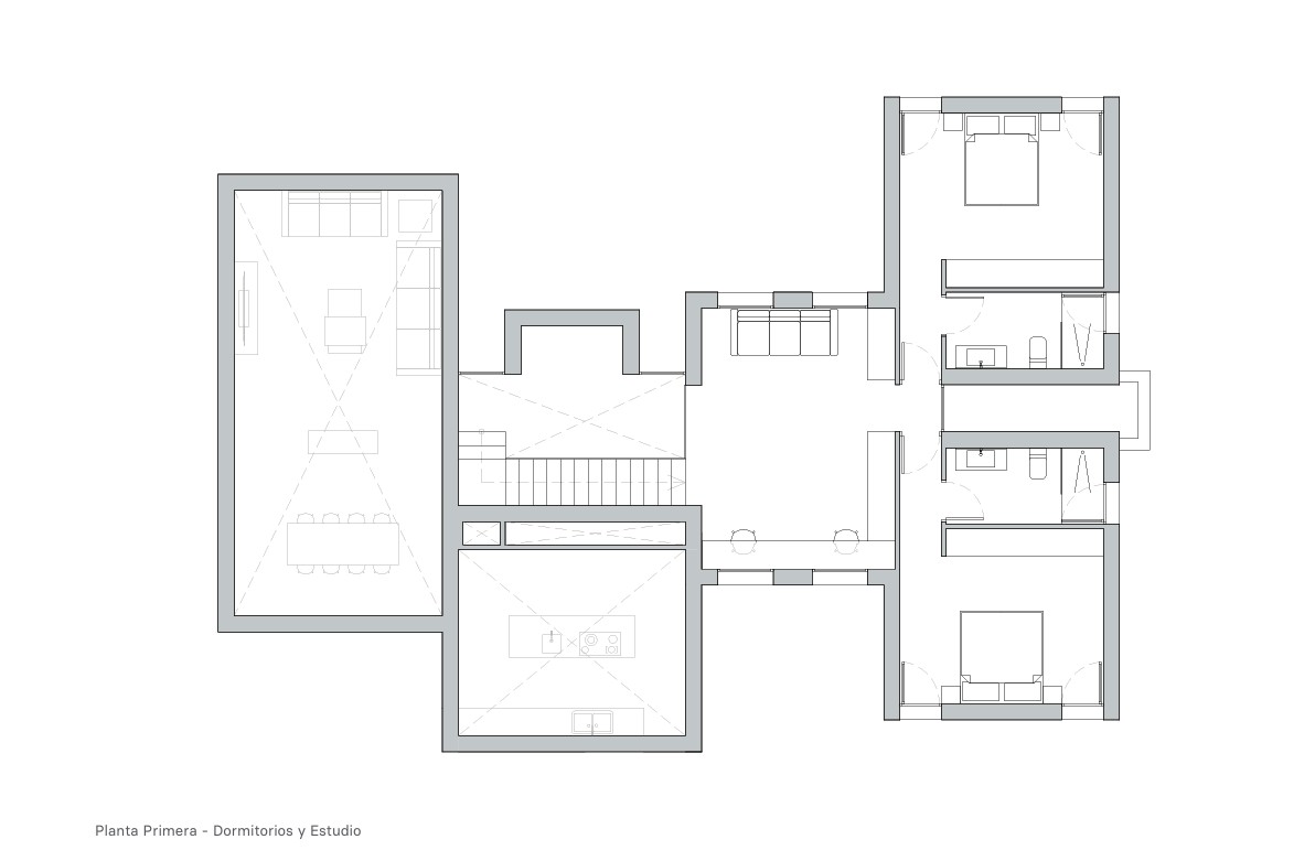 Detailed first-floor architectural plan featuring two double bedrooms with en-suite bathrooms and a central office overlooking the double-height living area.