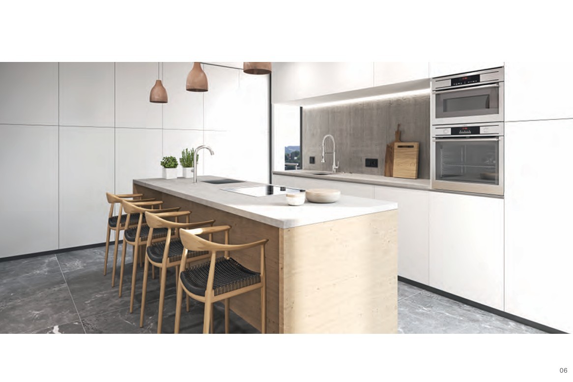 Modern kitchen featuring a wooden island with stone countertop, integrated double ovens, designer bar stools, and minimalist white cabinetry.