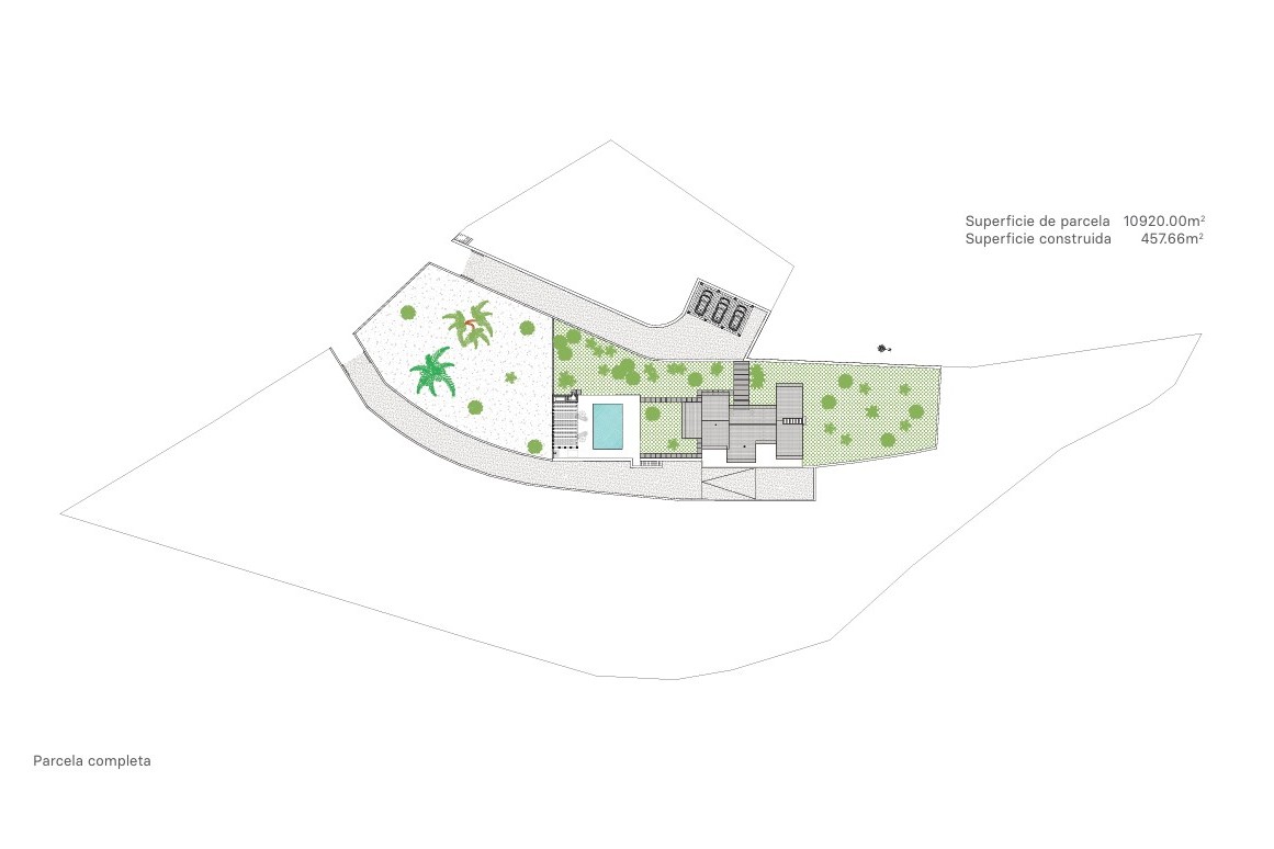 Site plan of the 10,920 m² plot illustrating the villa's footprint, swimming pool location, landscaped gardens, and private driveway.