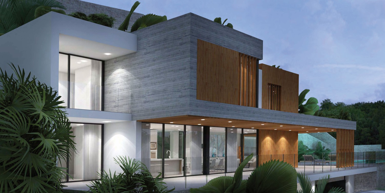 Modern facade featuring exposed concrete and wood accents. The illuminated ground floor reveals an open-concept kitchen and living area integrated with a covered terrace and glass railings.