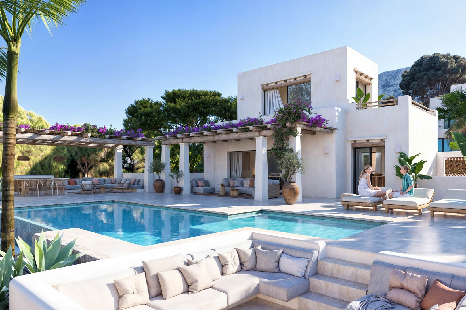 Pool view with bougainvillea-covered pergola and seating area with built-in sofas.