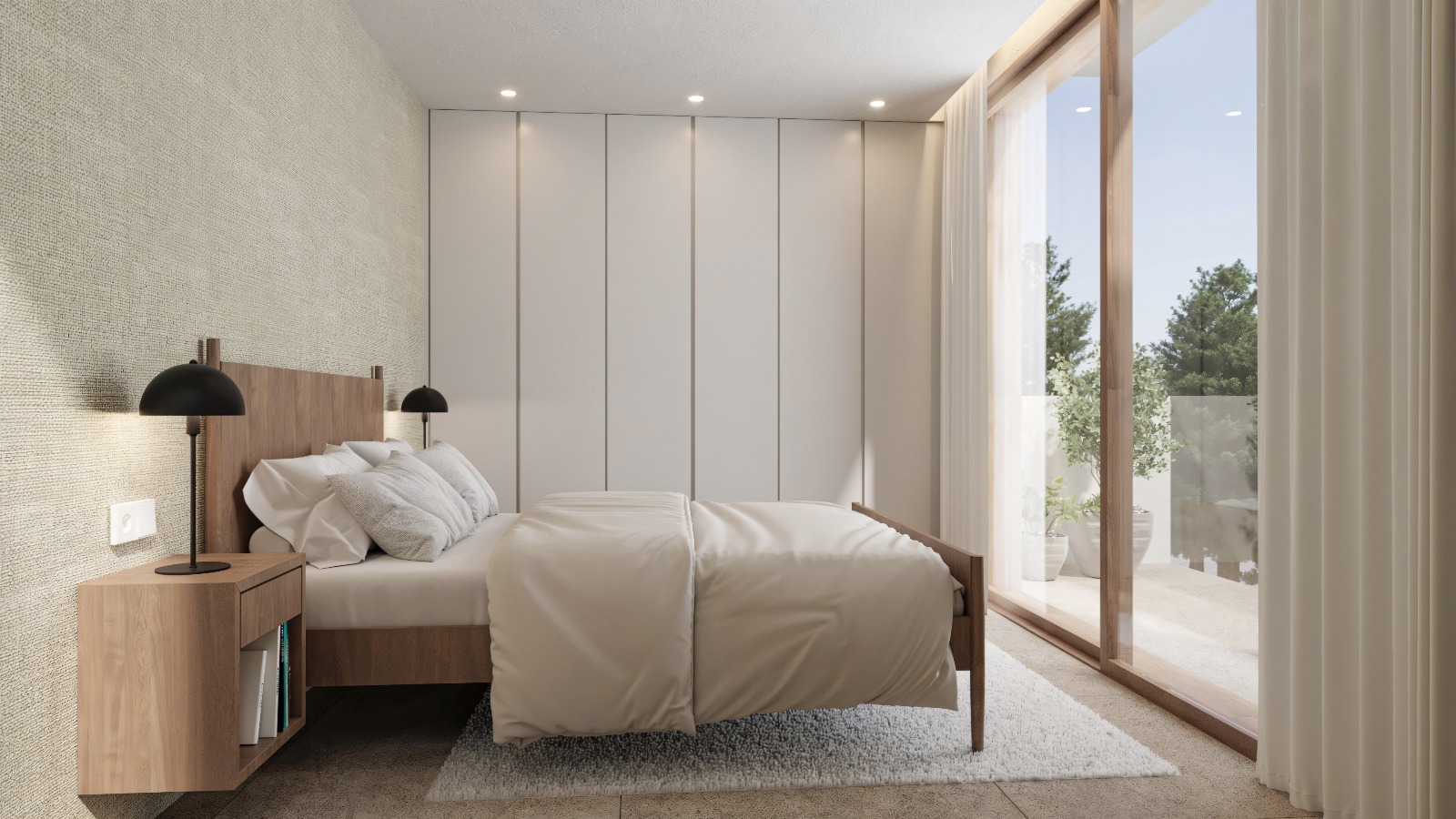 Modern bedroom featuring floor-to-ceiling integrated wardrobes, a wooden bed frame, and large sliding glass doors opening onto a private terrace.