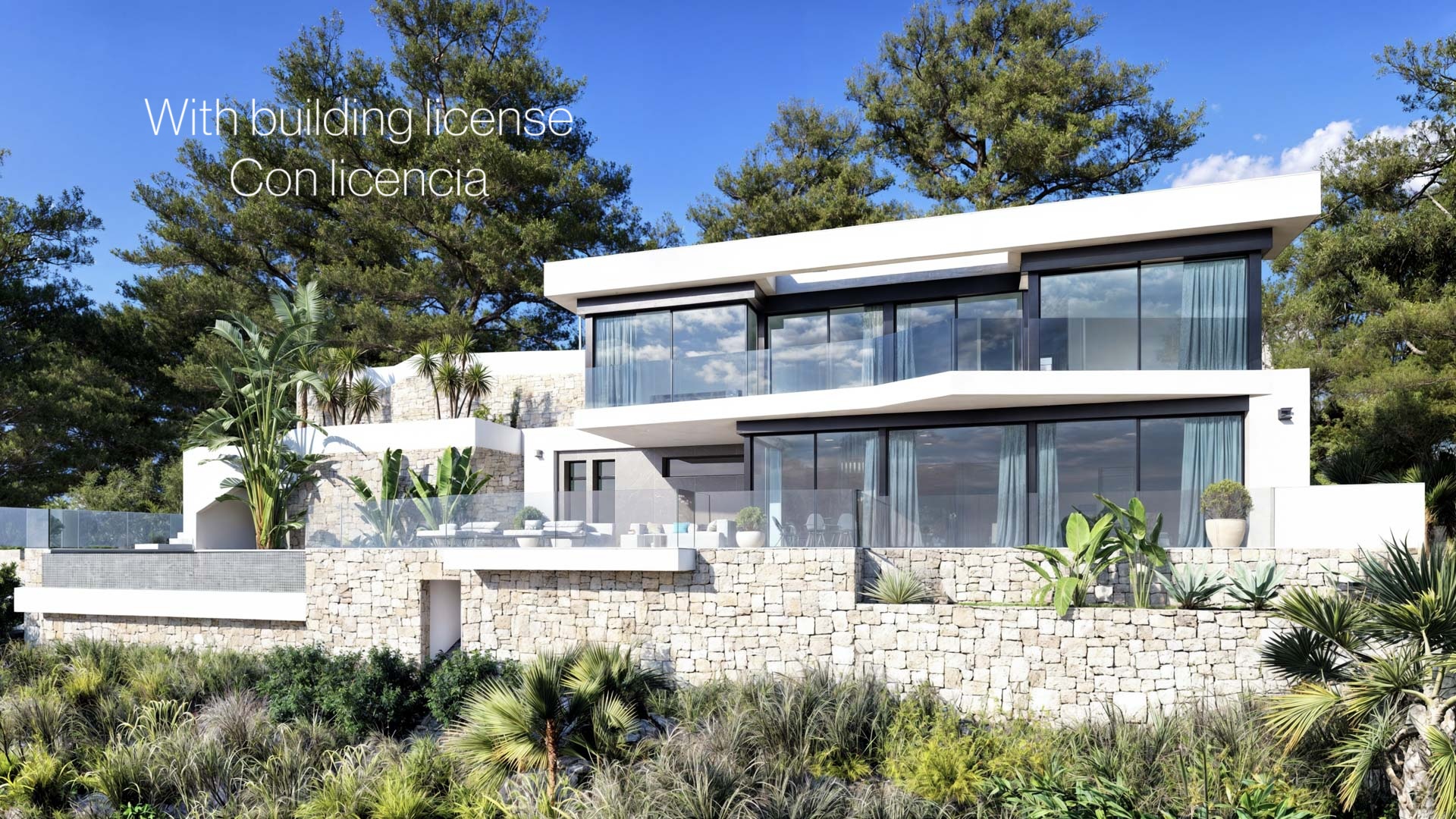 Modern two-story facade featuring natural stone walls, expansive floor-to-ceiling windows, and glass balustrades, integrated into a Mediterranean landscape with pine trees.