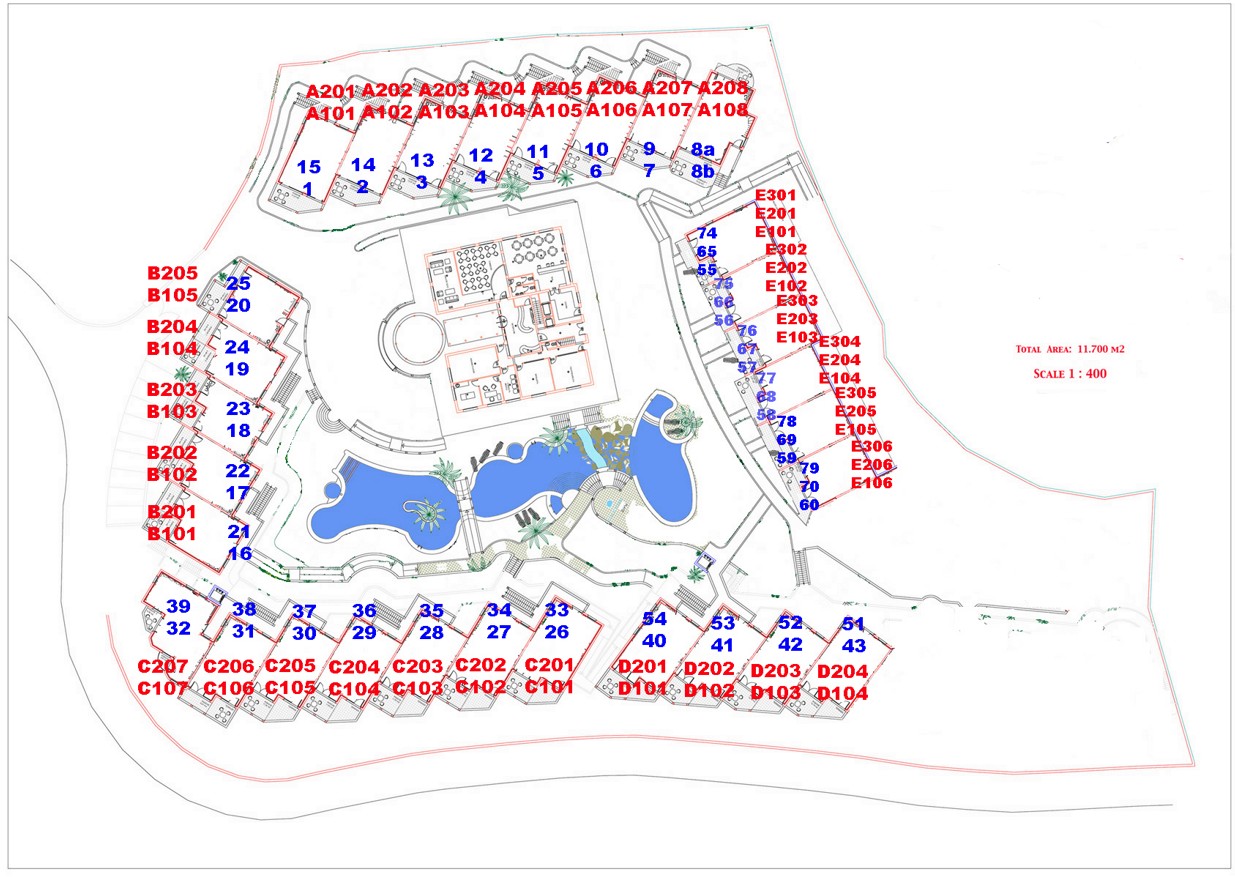 Detailed site plan of the residential complex showing the distribution of apartment blocks, the central lagoon pool, and communal facilities.