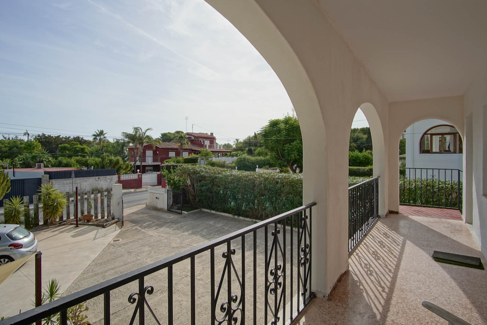 Covered balcony with arches