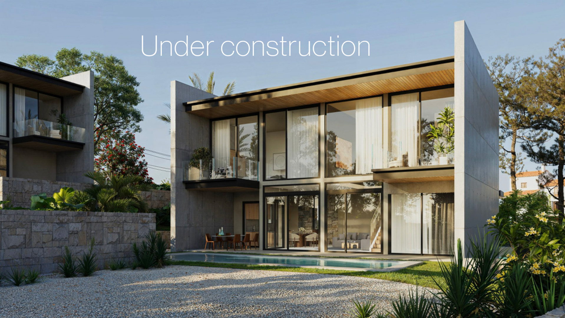 Modern concrete and glass facade featuring floor-to-ceiling windows, private upper-floor balconies, and a swimming pool adjacent to the living area.