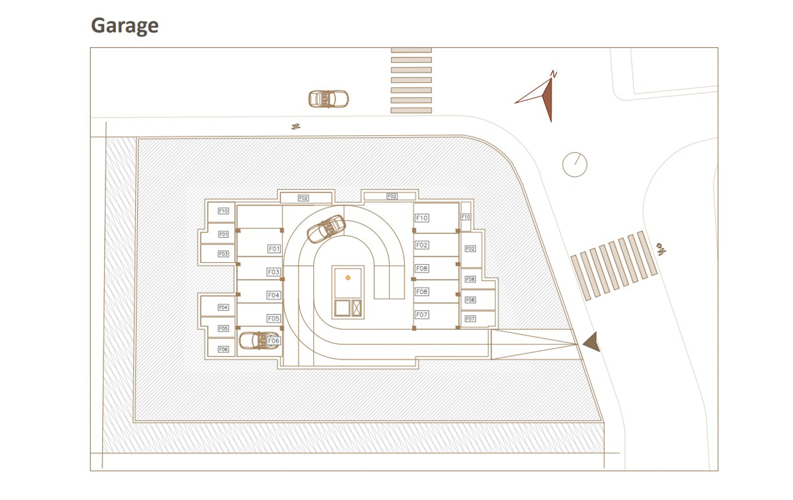 Technical floor plan of the underground garage, illustrating the layout of numbered parking spaces and the access ramp from the street.