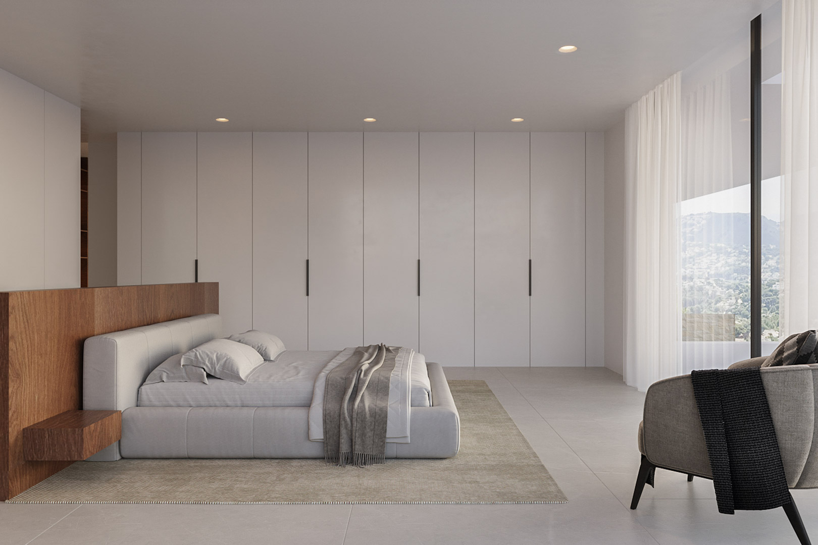 Contemporary bedroom featuring minimalist floor-to-ceiling wardrobes, a wooden headboard, and panoramic mountain views through large windows.