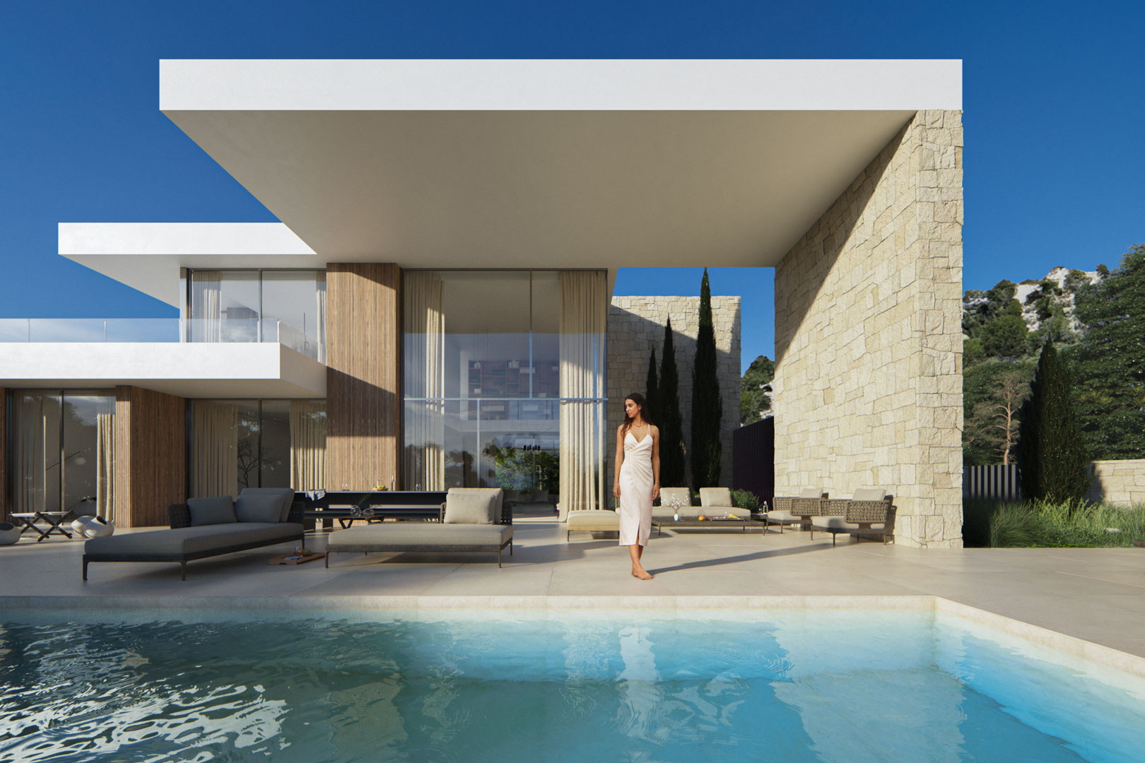 Exterior featuring a cantilevered porch, natural stone walls, and infinity pool. Double-height glass facades connect the living area with the terrace.