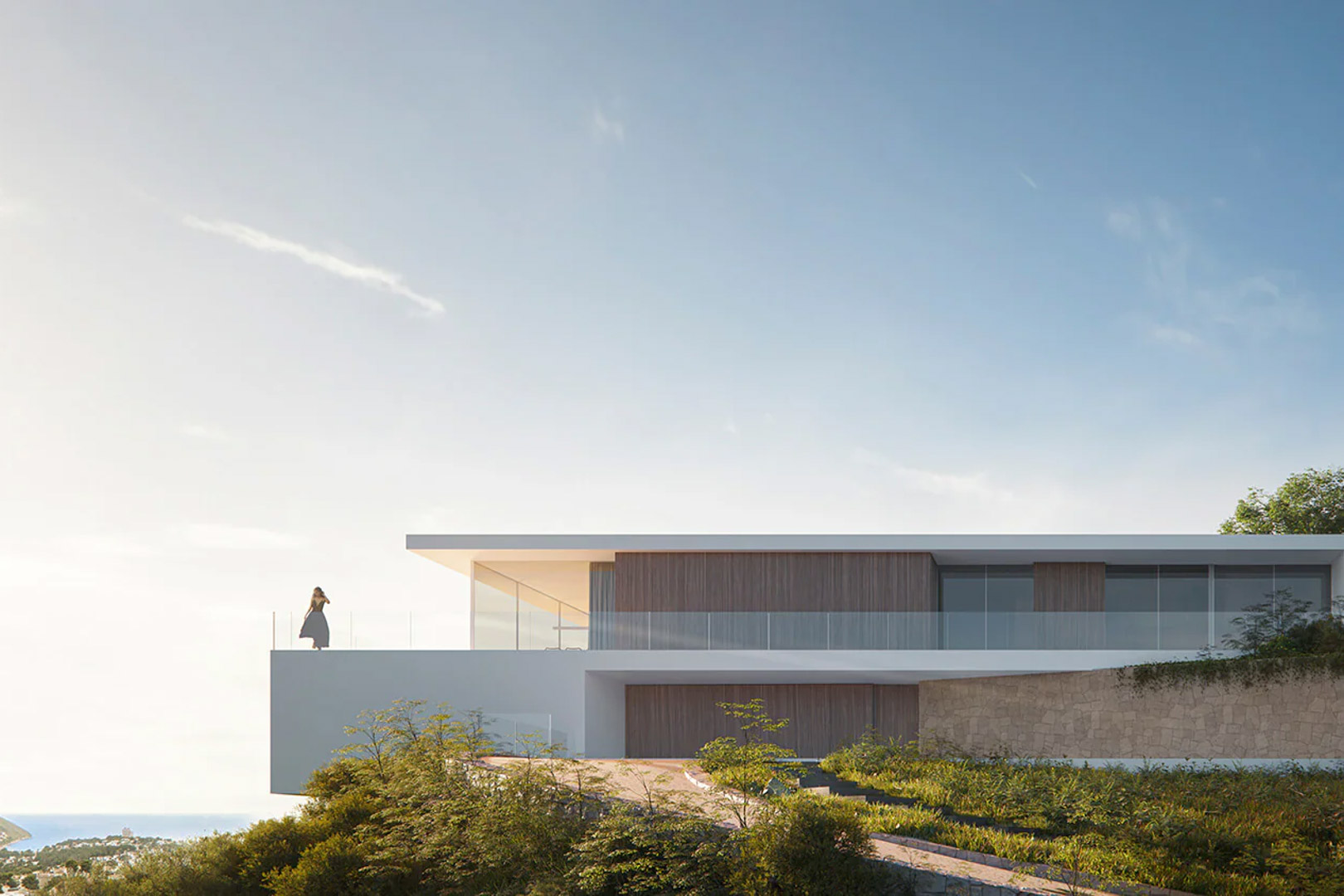 Modern exterior featuring cantilevered levels, vertical wood cladding, and stone walls, with a glass-railed terrace overlooking the Mediterranean coastline.