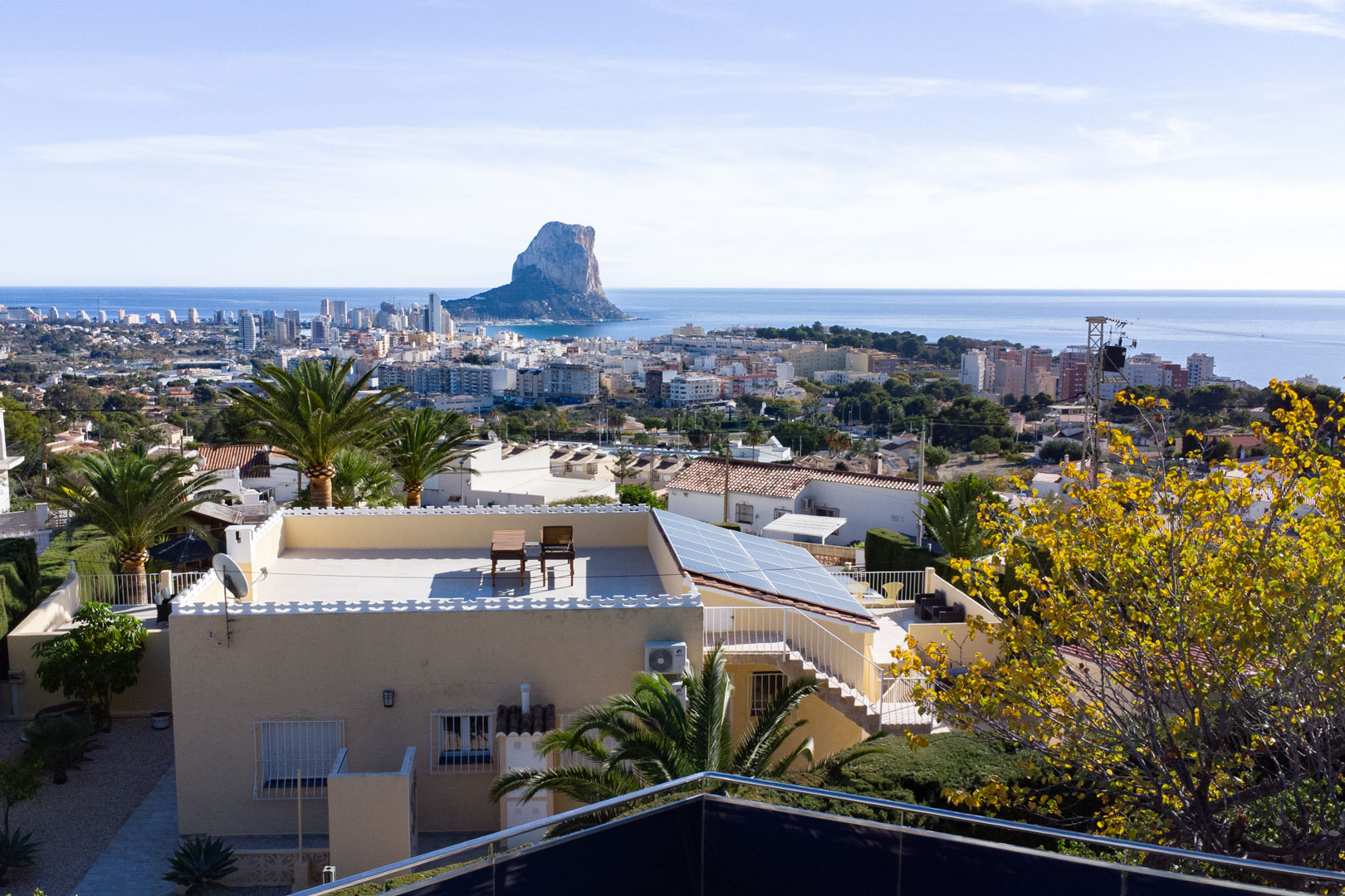 Panoramic view from the property overlooking the Peñón de Ifach and Calpe skyline, showcasing the Mediterranean coastline and surrounding residential area.