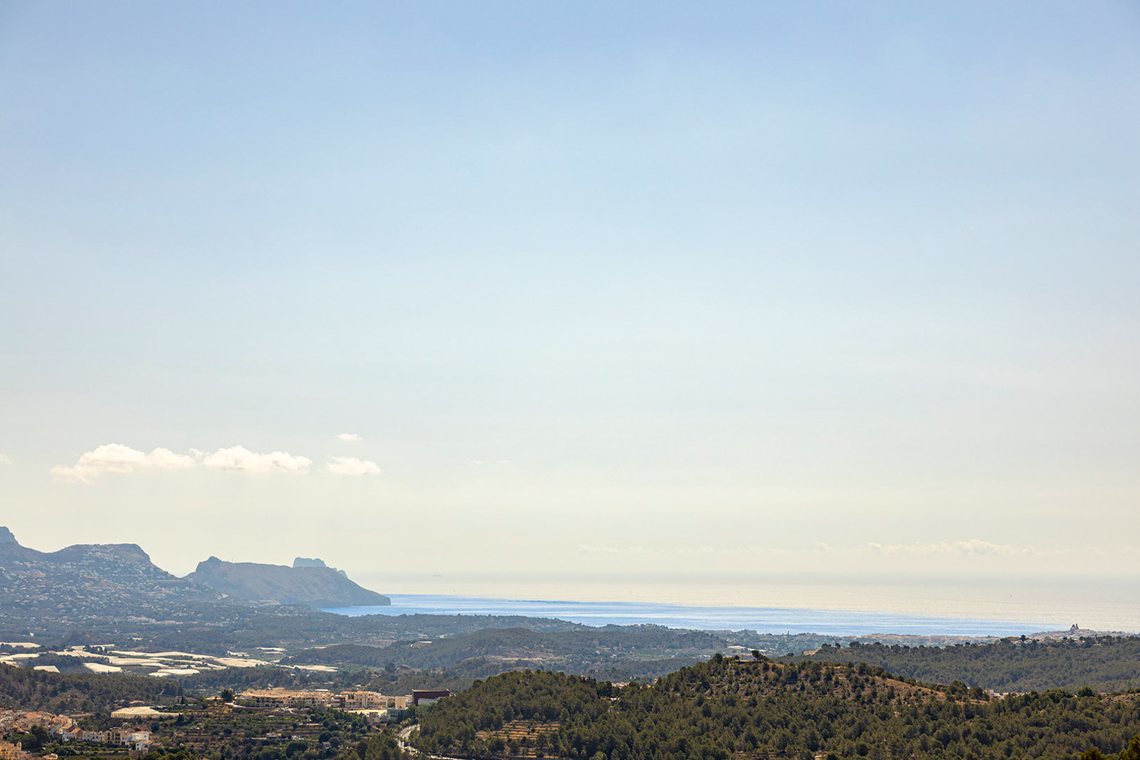 Unobstructed panoramic views of the Mediterranean Sea and the coastal mountain range from the property's elevated vantage point.