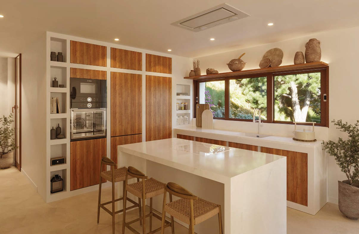 Modern kitchen with central island, wood cabinets, and garden view.