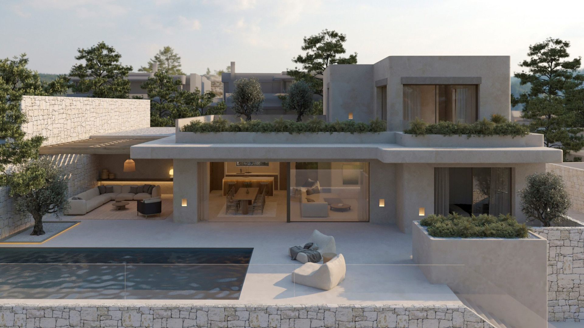 Modern villa exterior featuring a private pool, expansive terrace, and a covered outdoor lounge area. Large glass doors integrate indoor living and dining spaces with the serene outdoor environment.