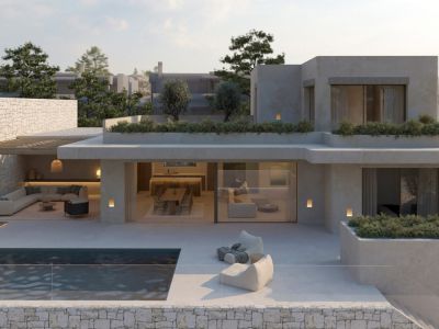 Modern villa exterior featuring a private pool, expansive terrace, and a covered outdoor lounge area. Large glass doors integrate indoor living and dining spaces with the serene outdoor environment.