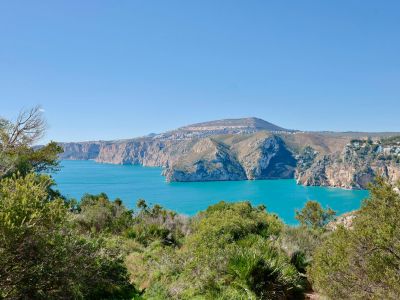 Panoramic views of the rocky coastline and Mediterranean Sea from the lush greenery of Jávea.