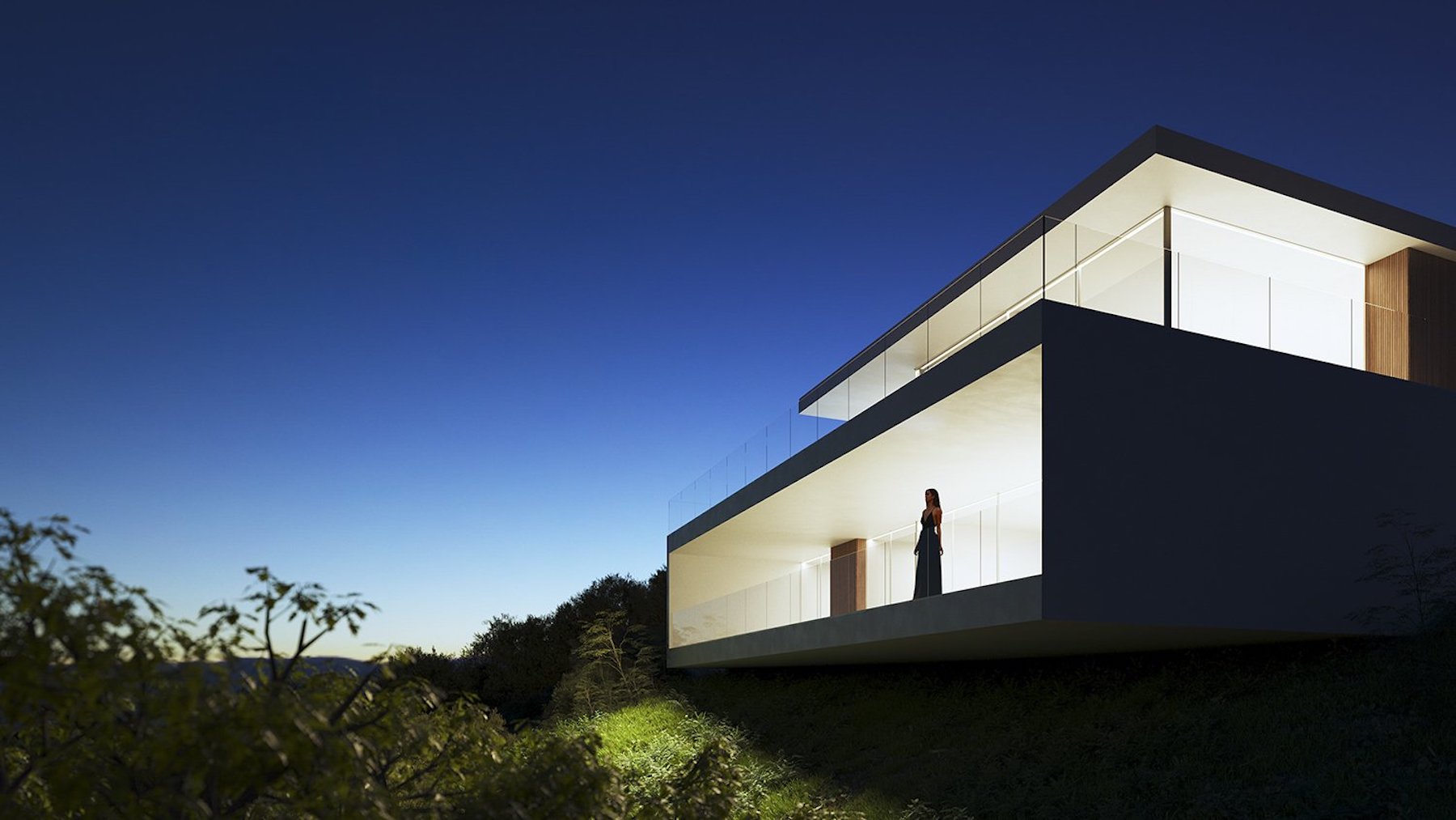 Exterior twilight view of the villa featuring cantilevered terraces with glass balustrades and warm interior lighting against a deep blue sky.