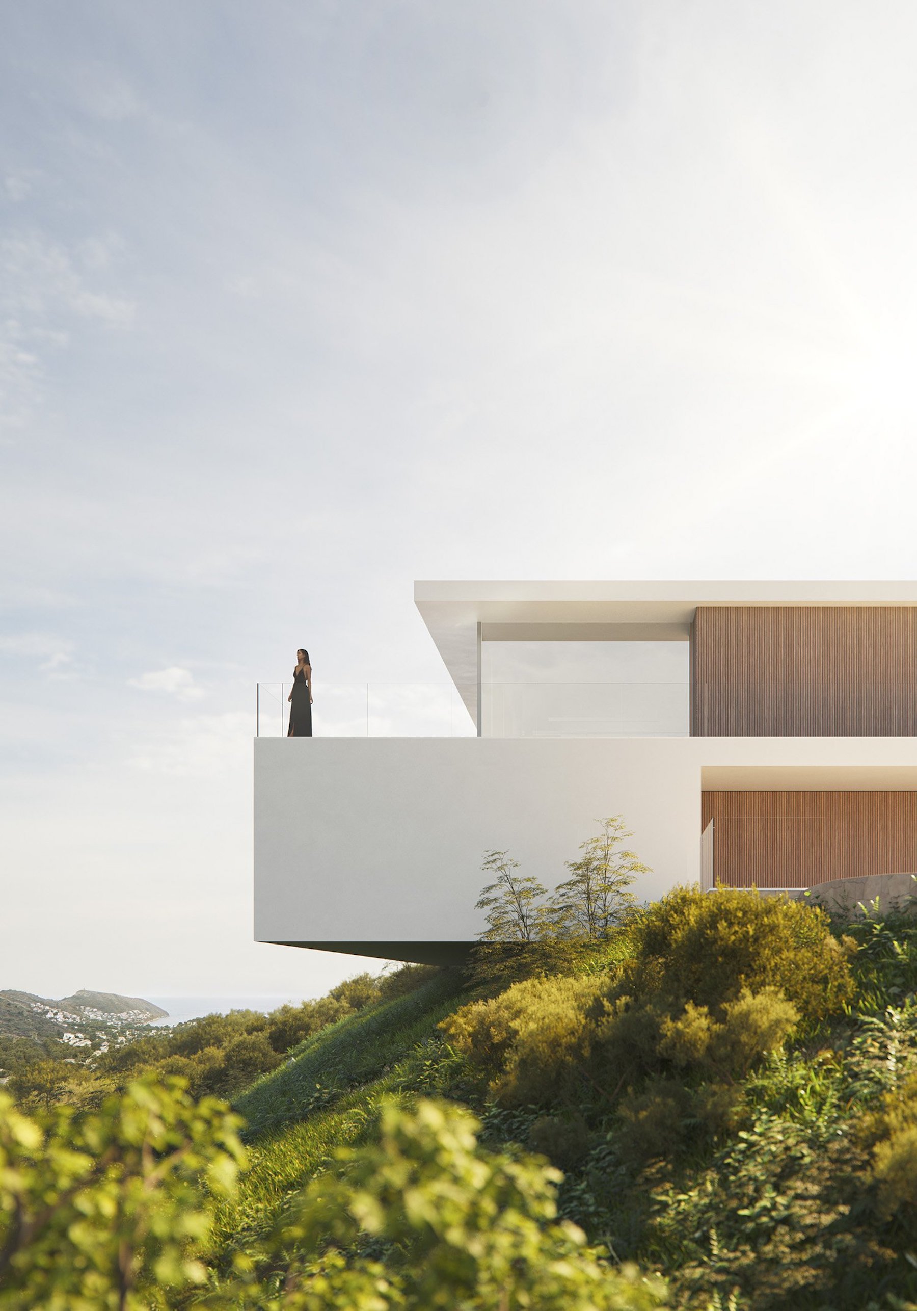 Minimalist cantilevered terrace featuring glass railings, vertical wood cladding, and panoramic views of the surrounding hills and coastline.
